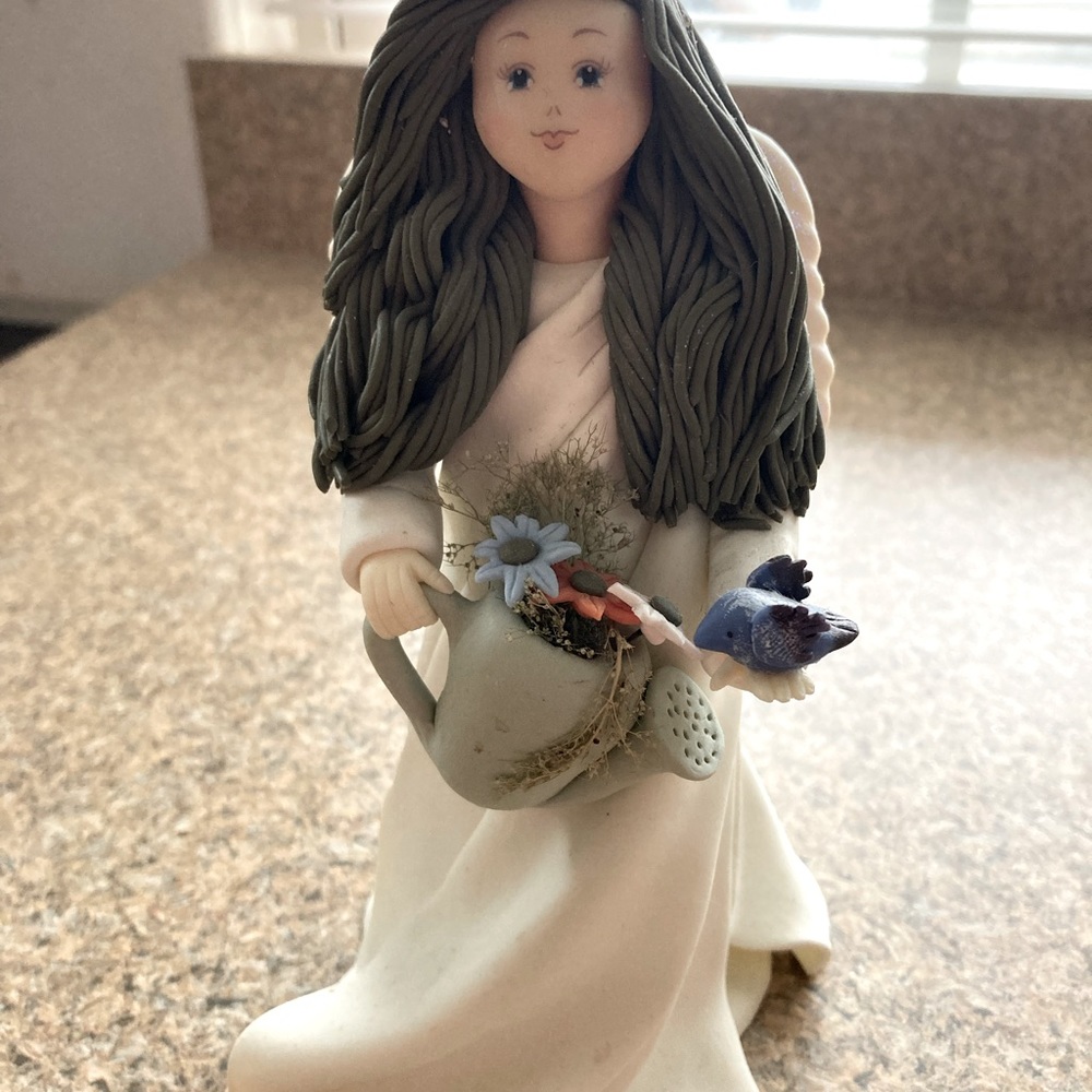 Resin brunette angel with blue eyes
